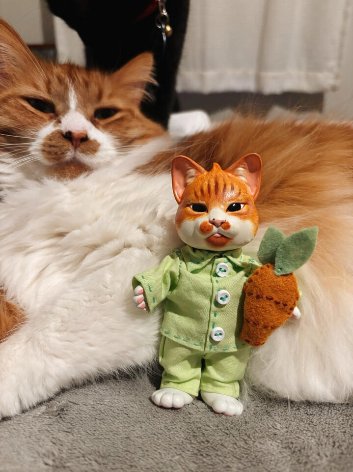 Resin doll painted in acrylic. 2026.